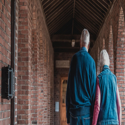 older couple walking park
